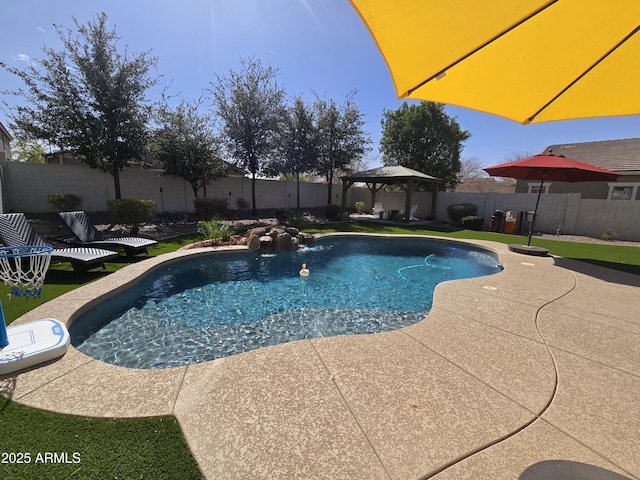 view of swimming pool with a gazebo, a fenced backyard, a fenced in pool, and a patio