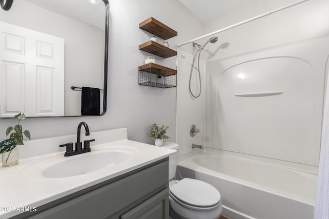 full bath with vanity, toilet, and shower / bath combination