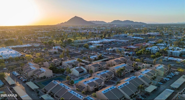 aerial view at dusk with a mountain view