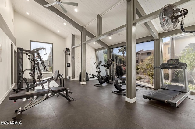 exercise room with ceiling fan and high vaulted ceiling