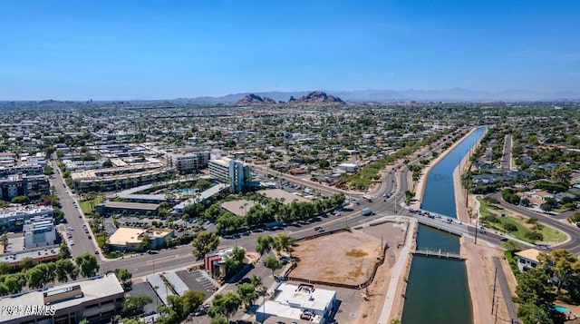 bird's eye view featuring a water and mountain view