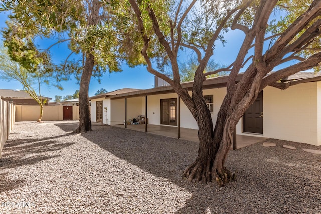 back of house featuring a patio area