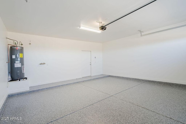 garage featuring a garage door opener and electric water heater