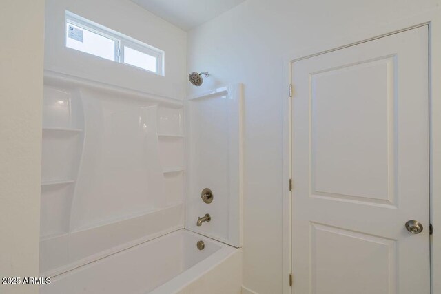 bathroom featuring shower / bath combination