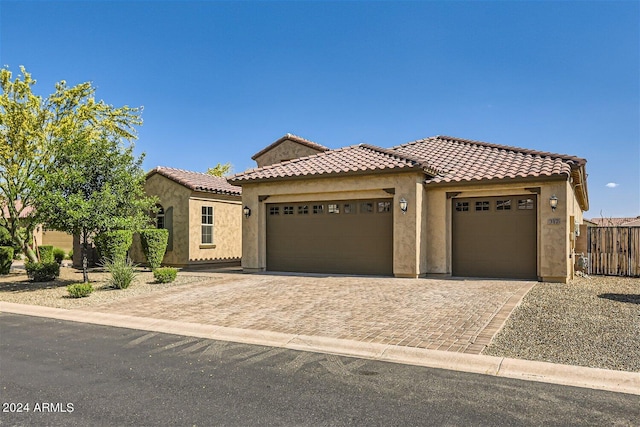 view of front of property featuring a garage