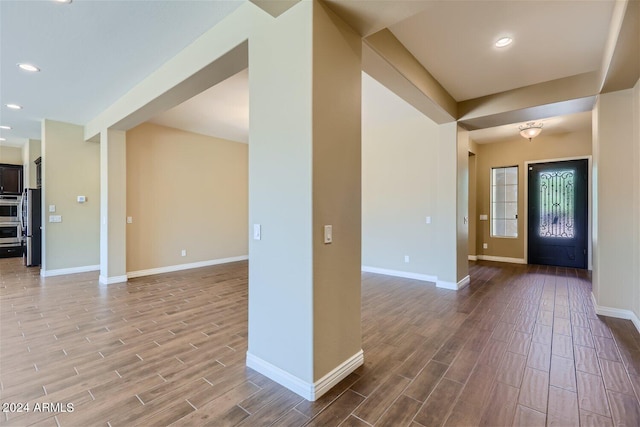 empty room featuring hardwood / wood-style flooring