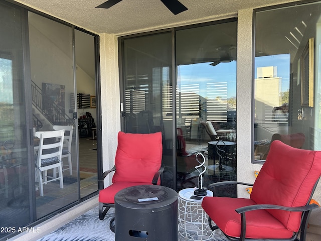 view of patio / terrace featuring ceiling fan