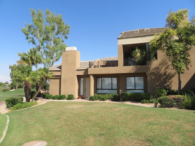 view of front of home featuring a front lawn