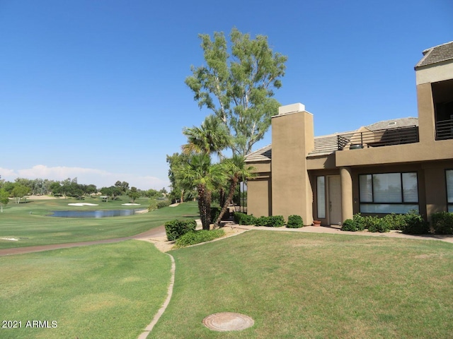 view of yard with a water view