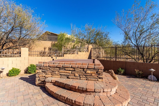 view of patio with a fenced backyard