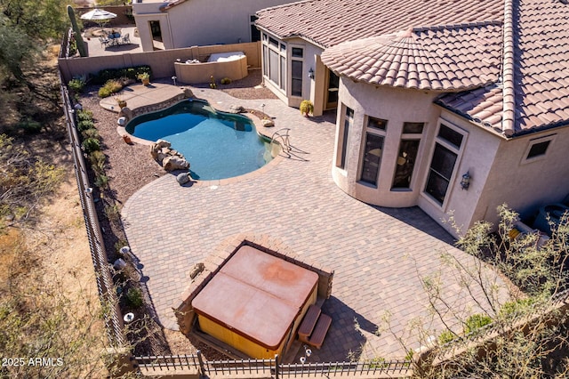 view of pool featuring a patio, a fenced backyard, and a fenced in pool