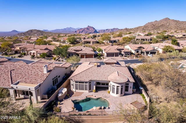 birds eye view of property featuring a residential view and a mountain view