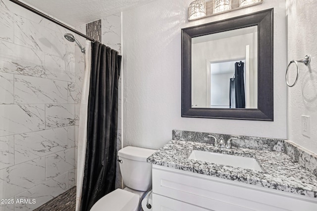 1017 S Allen, Mesa, AZ 85204 - full bath with vanity, a textured wall, a shower stall, and a textured ceiling