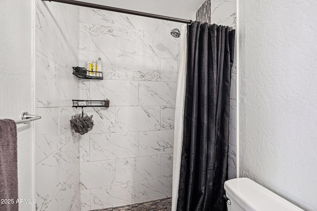 1017 S Allen, Mesa, AZ 85204 - bathroom with a textured wall and a tile shower