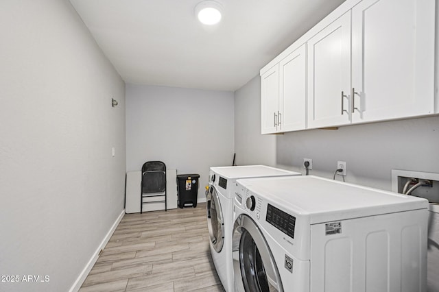 1017 S Allen, Mesa, AZ 85204 - laundry room with cabinet space, washer and clothes dryer, and light wood finished floors