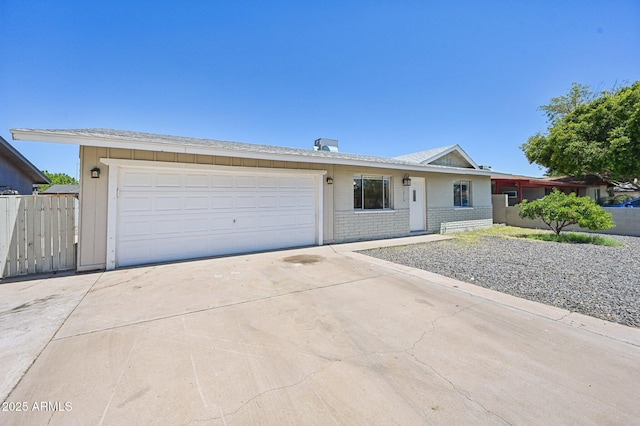 1017 S Allen, Mesa, AZ 85204 - single story home with concrete driveway, a garage, and brick siding