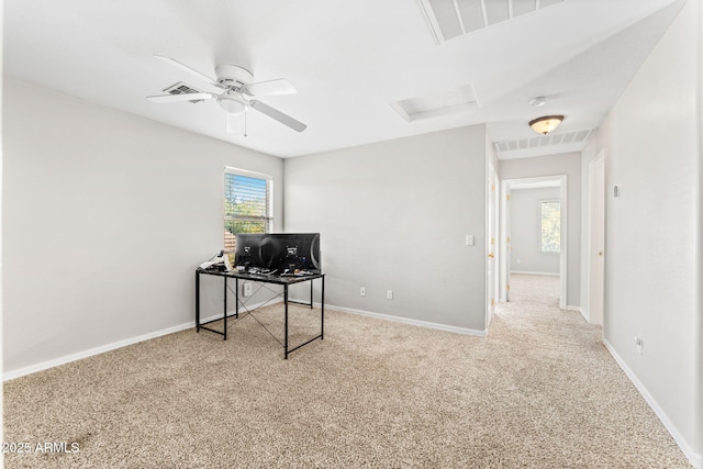 home office featuring ceiling fan and carpet flooring