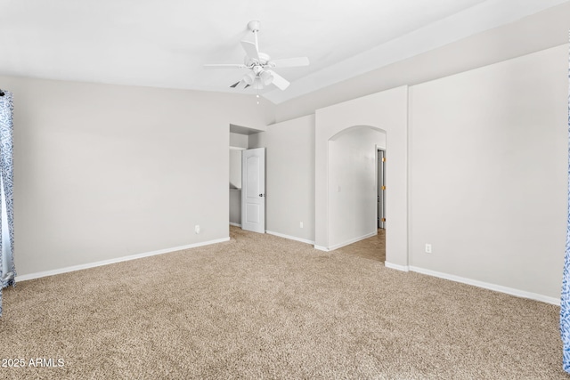 unfurnished room featuring ceiling fan, light colored carpet, and lofted ceiling