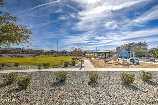 view of jungle gym featuring a gazebo and a lawn