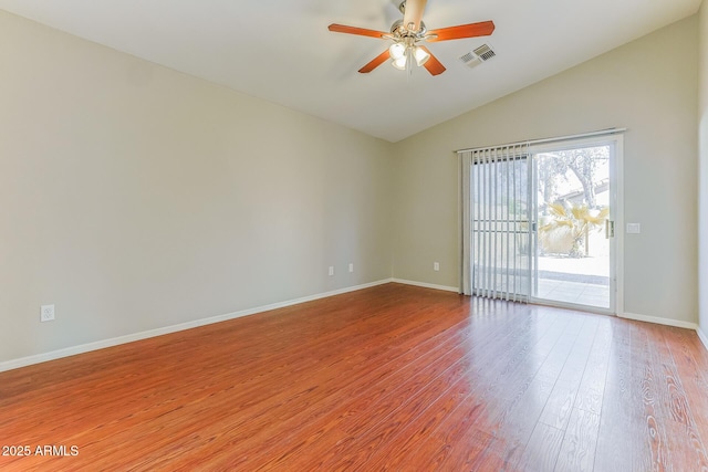 1048 N Arroya, Mesa, AZ 85205 - spare room featuring vaulted ceiling, ceiling fan, and light wood-style flooring