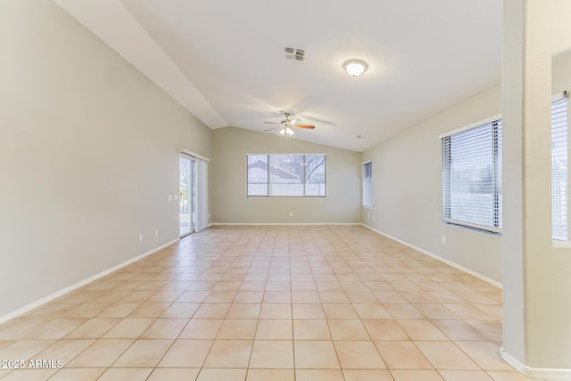 1048 N Arroya, Mesa, AZ 85205 - empty room featuring ceiling fan, lofted ceiling, and light tile patterned floors