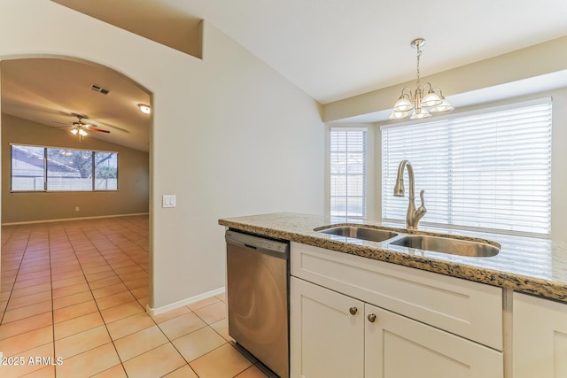 1048 N Arroya, Mesa, AZ 85205 - kitchen featuring stainless steel dishwasher, vaulted ceiling, light tile patterned floors, hanging light fixtures, and a chandelier
