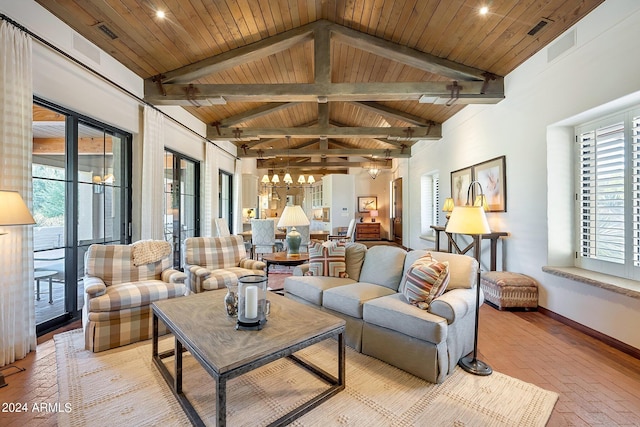 living room featuring plenty of natural light, wooden ceiling, and high vaulted ceiling