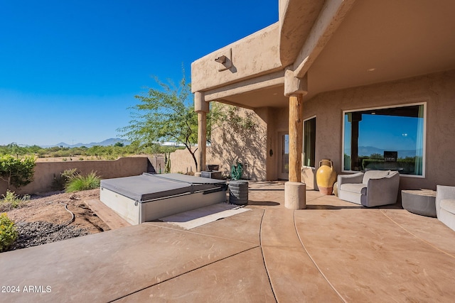 view of patio / terrace with a mountain view