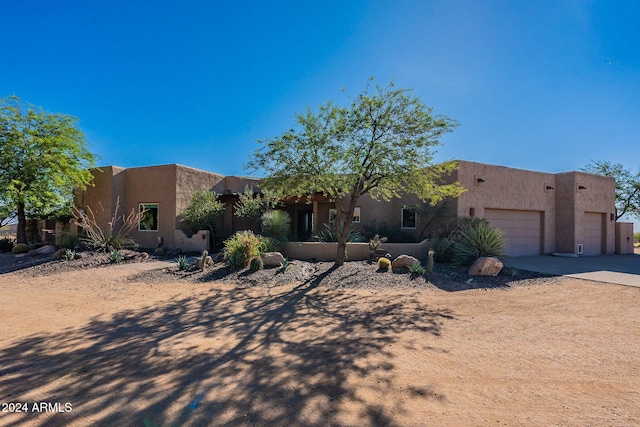 adobe home with a garage