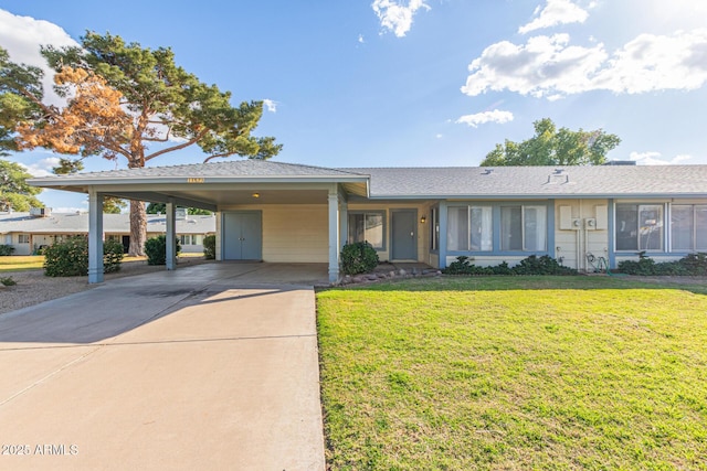 11671 S Jokake St, Phoenix, AZ 85044 - ranch-style house featuring a front lawn, concrete driveway, and an attached carport