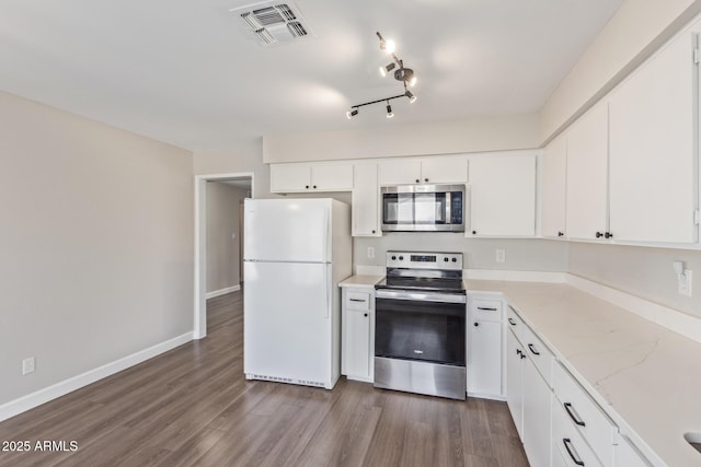 11671 S Jokake St, Phoenix, AZ 85044 - kitchen featuring appliances with stainless steel finishes, dark wood-type flooring, white cabinetry, baseboards, and light stone countertops
