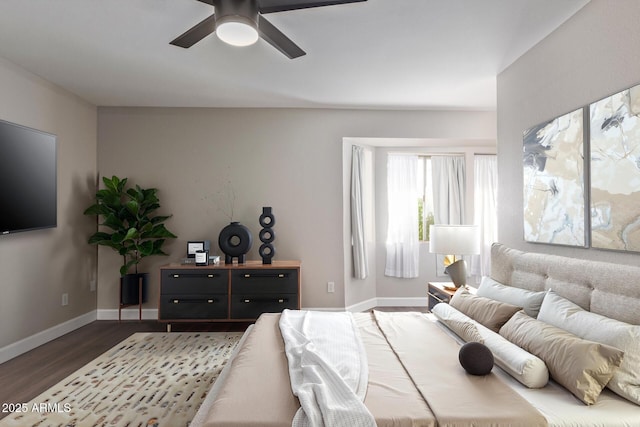 11671 S Jokake St, Phoenix, AZ 85044 - bedroom with wood finished floors, baseboards, and ceiling fan
