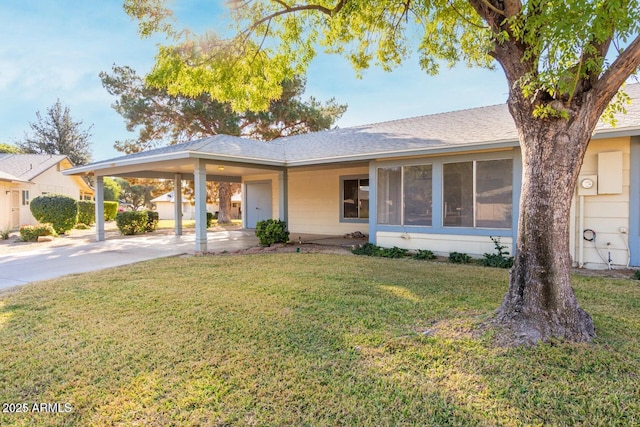 11671 S Jokake St, Phoenix, AZ 85044 - ranch-style house with a carport, a front yard, driveway, and a shingled roof