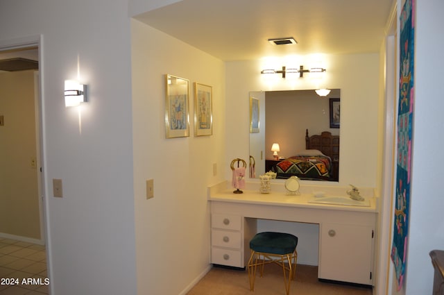 bathroom featuring tile patterned floors and vanity