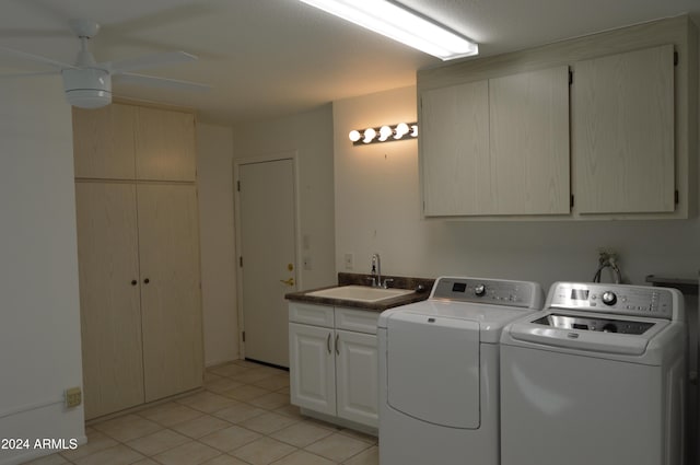 laundry room with ceiling fan, sink, cabinets, separate washer and dryer, and light tile patterned floors