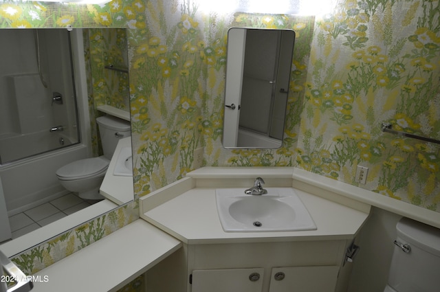 full bathroom with tile patterned floors, vanity, enclosed tub / shower combo, and toilet