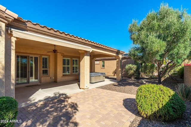 view of patio / terrace featuring ceiling fan