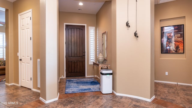 foyer entrance with a wealth of natural light