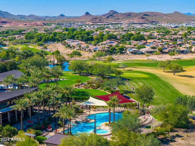 birds eye view of property featuring a mountain view