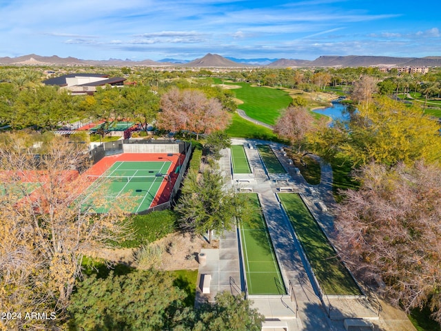 drone / aerial view featuring a water and mountain view