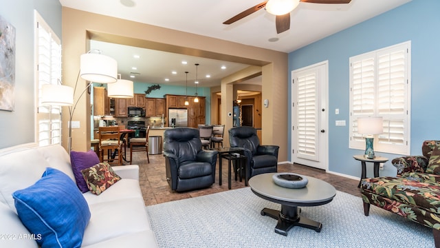 living room with ceiling fan