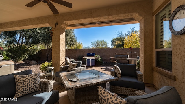 view of patio with outdoor lounge area, ceiling fan, and grilling area