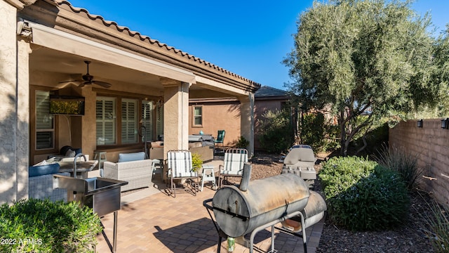 view of patio / terrace with outdoor lounge area and ceiling fan