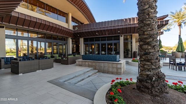 view of patio / terrace with outdoor lounge area and a balcony