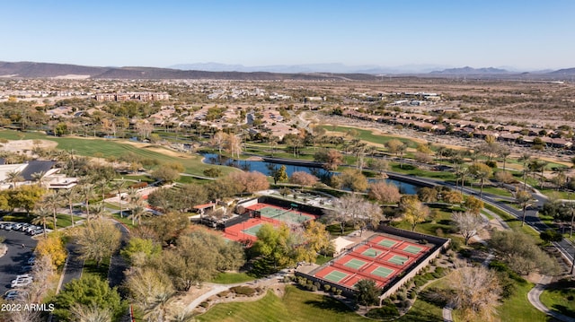 birds eye view of property with a mountain view