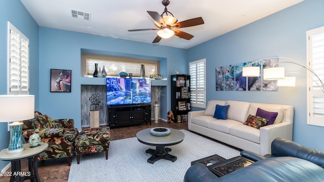 living room featuring ceiling fan