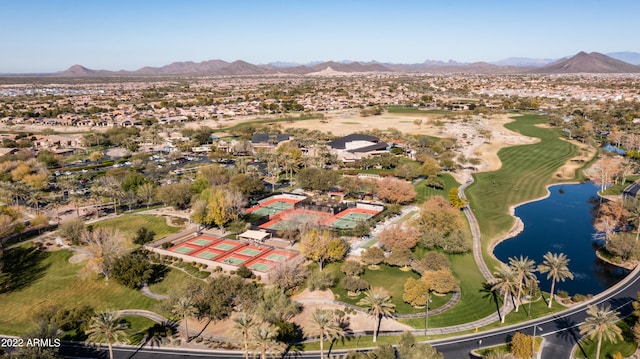 birds eye view of property featuring a water and mountain view