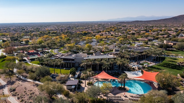 birds eye view of property with a mountain view