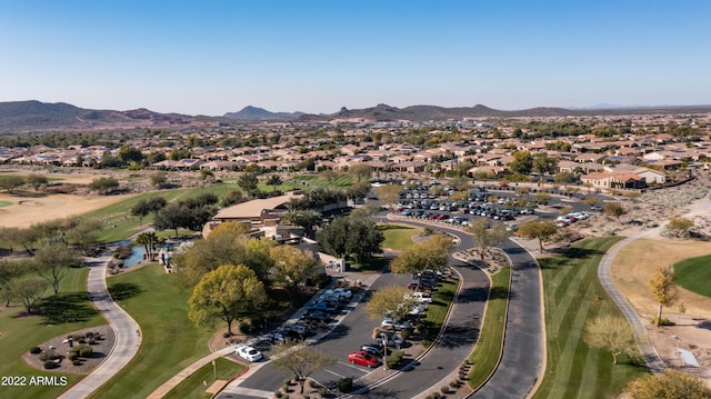 birds eye view of property with a mountain view