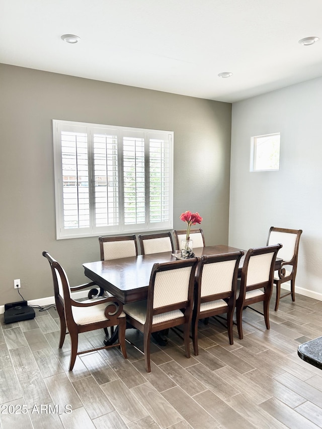 4956 S Leisure Way, Gilbert, AZ 85298 - dining space with healthy amount of natural light, light wood-style floors, baseboards, and recessed lighting